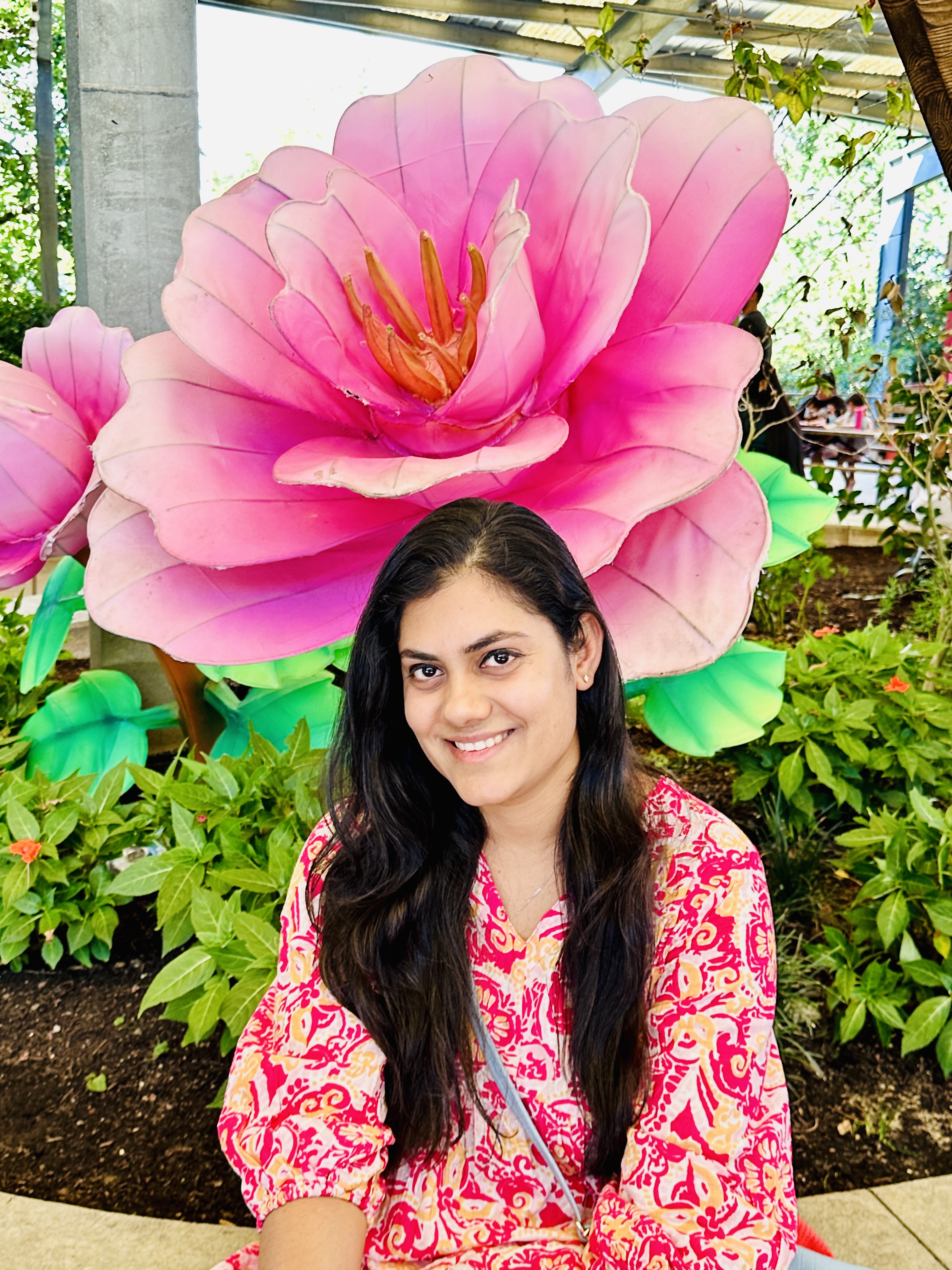 Pratiksha helping children during play-based learning at BuzzingBeez Home Daycare